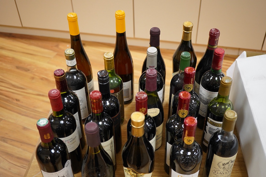 A collection of twenty four various bottles of wine to include Chateau Neuf Du Pape, 2001